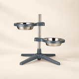 Adjustable double dog feeder with grey supports and two removable stainless steel bowls