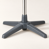 Close-up of the grey four-foot base and central support