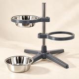 Feeder with one stainless steel bowl removed from its holder