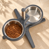 Overhead view of the two stainless steel bowls and grey holders