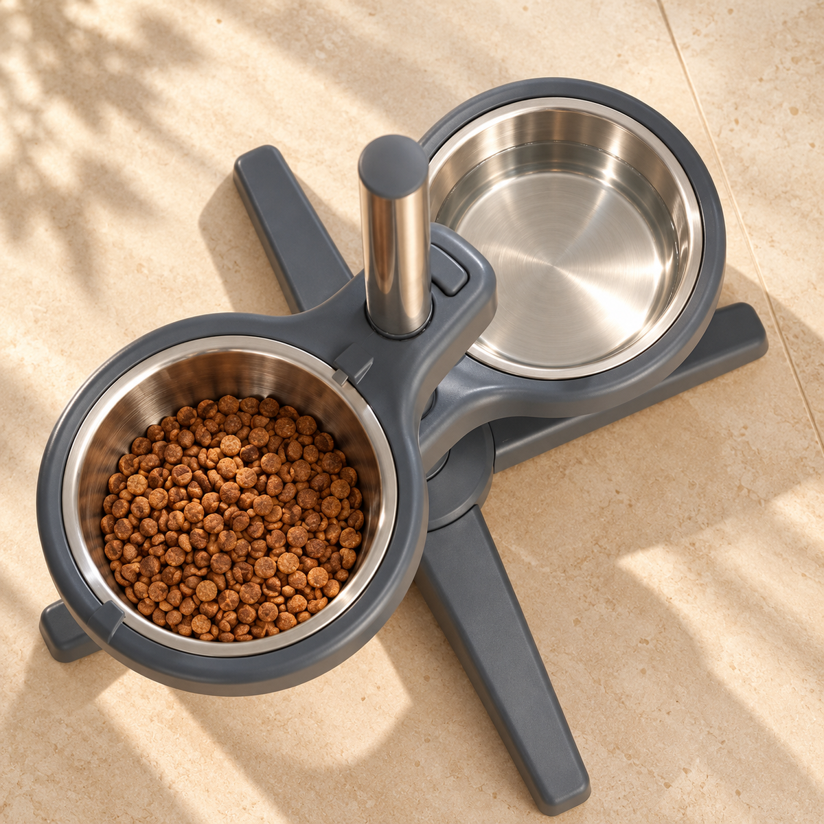 Overhead view of the two stainless steel bowls and grey holders