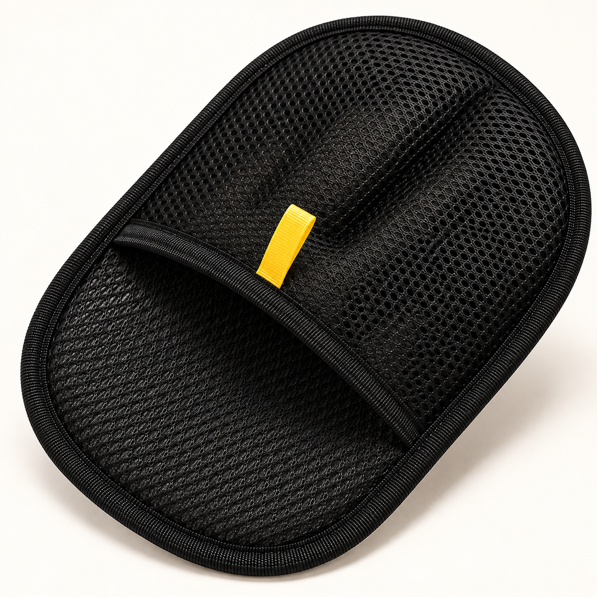 Close-up of the MAVORNE FurLift glove mesh, stitching and yellow pull tab